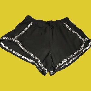 Bethany Mota black shorts with embroidered white trim. Size M